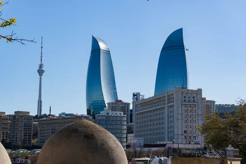 The Flame Towers and Baku skyline in daylight under a clear blue sky, Azerbaijan