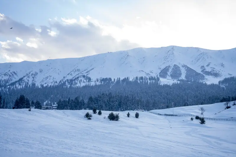 Snow-covered slopes and peaks in Gulmarg in winter