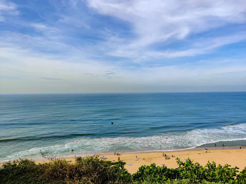 Waves rolling onto Varkala beach below the cliffs, Kerala