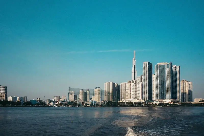The Ho Chi Minh City skyline seen from the Saigon River on a clear day